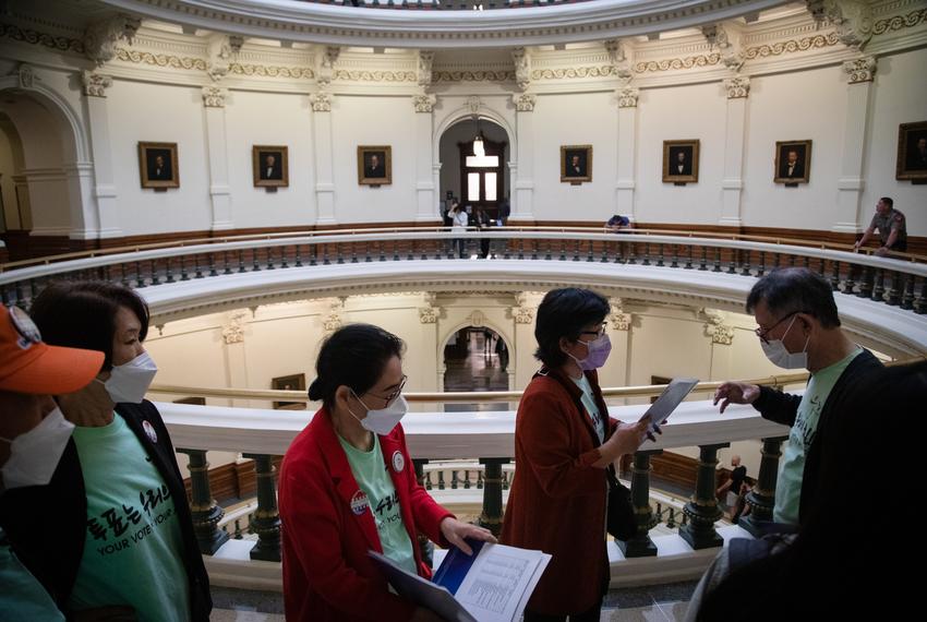 Hyunja Norman, executive director of Woori Juntos, leads her group through the state Capitol rotunda as they make their way to their next lawmaker meeting on Asian American Pacific Islander (AAPI) Advocacy Day on March 9, 2023. The group hoped to speak with lawmakers and seek support for bills that would improve language access for Korean and Spanish speakers in regards to health and social services,