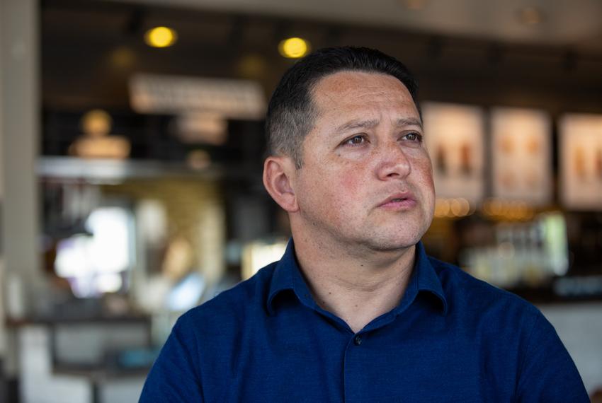 District 23 Rep. Tony Gonzales speaks with a reporter at a Starbucks in San Antonio on Aug. 24, 2022.